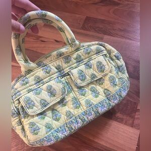 Vintage Vera Bradley slight staining on the inside of the bag.